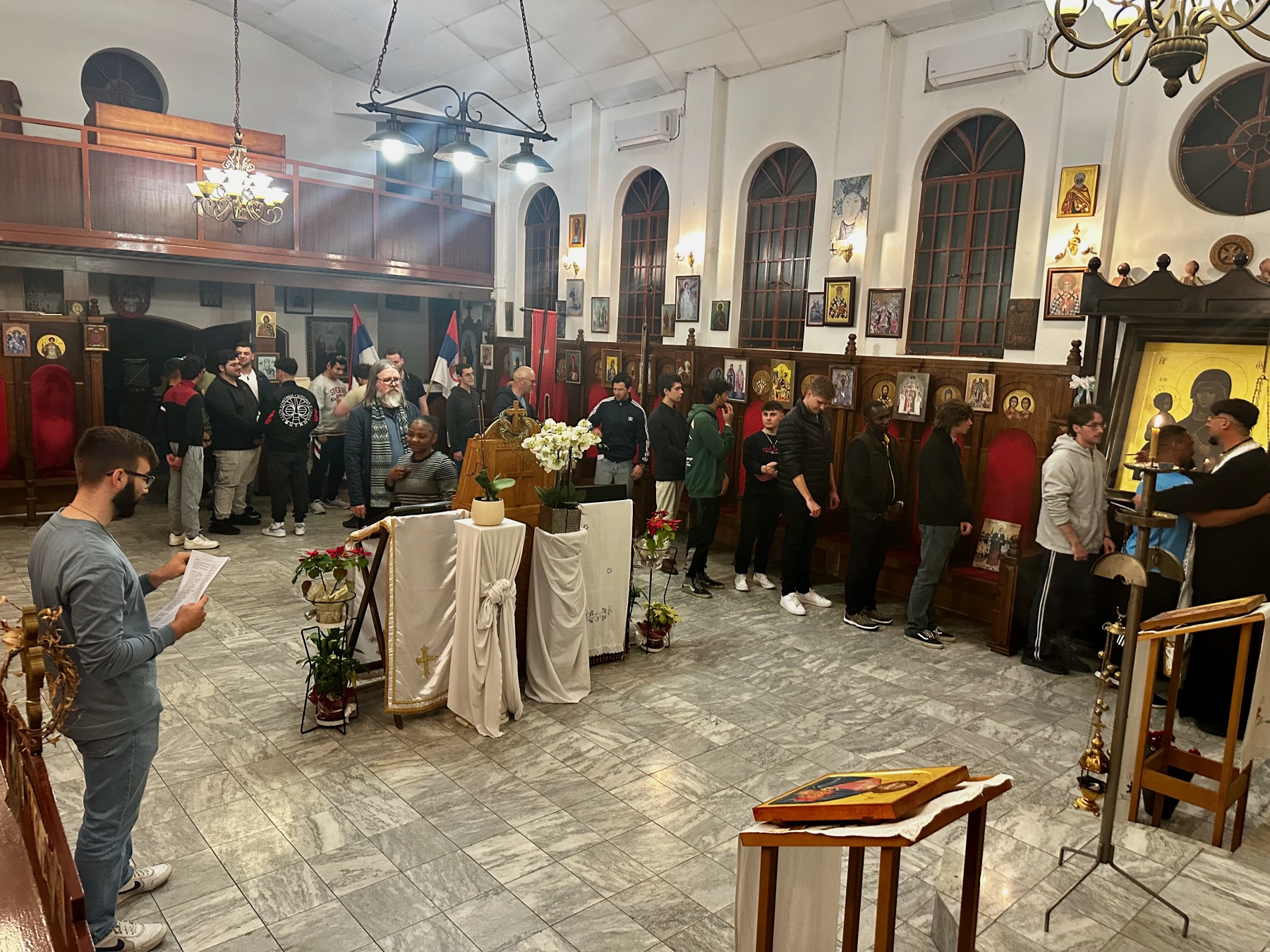 A parishioner being anointed with blessed oil during a Friday night Akathist