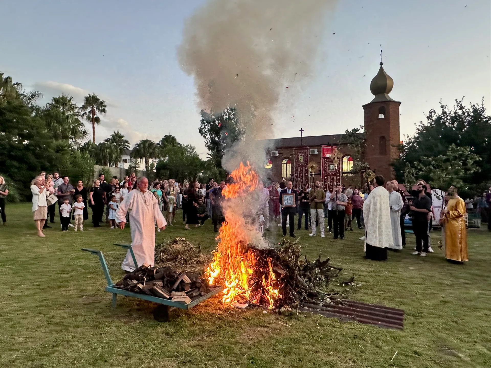 Parishioners gathered outside St Thomas Serbian Orthodox Church for the Nativity Eve Badnjak bonfire