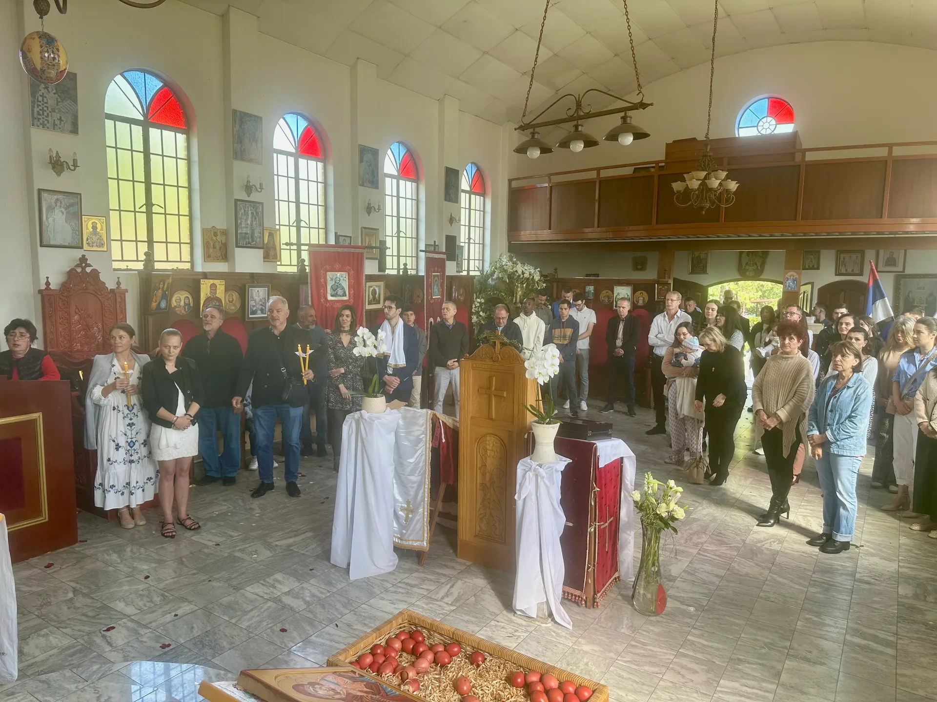 The congregation standing in prayer during the Divine Liturgy.