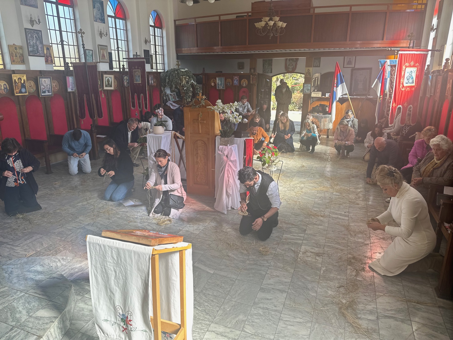 The church decorated with green branches for the Feast of Pentecost